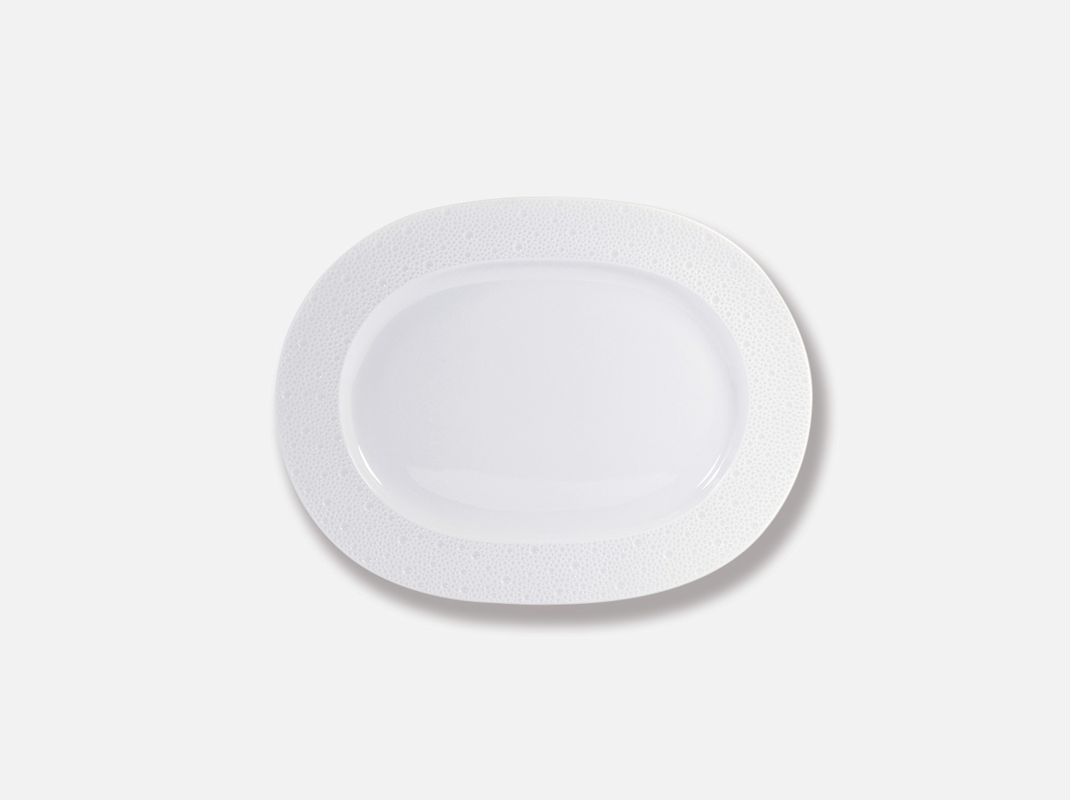 Assiette ovale 30 cm en porcelaine de la collection Ecume Bernardaud