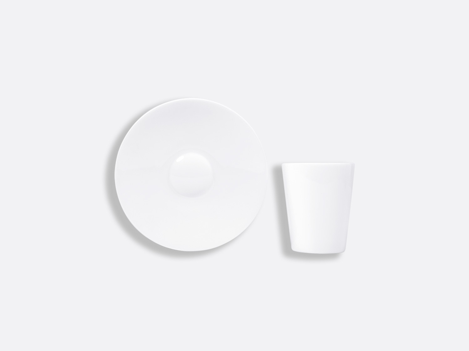 Tasse et soucoupe café Loop 7 cl en porcelaine de la collection FANTAISIES BLANCHES Bernardaud
