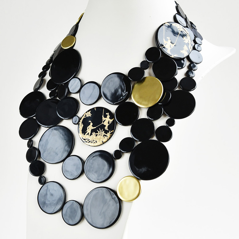 China Disque Noir et Or Large Bib of the collection Be Bold Over | Bernardaud