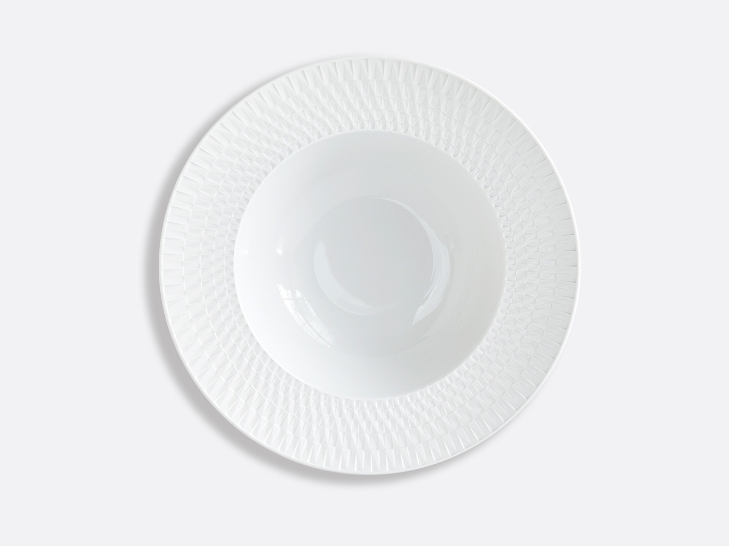 Assiette creuse à aile 22,5 cm en porcelaine de la collection Twist Bernardaud