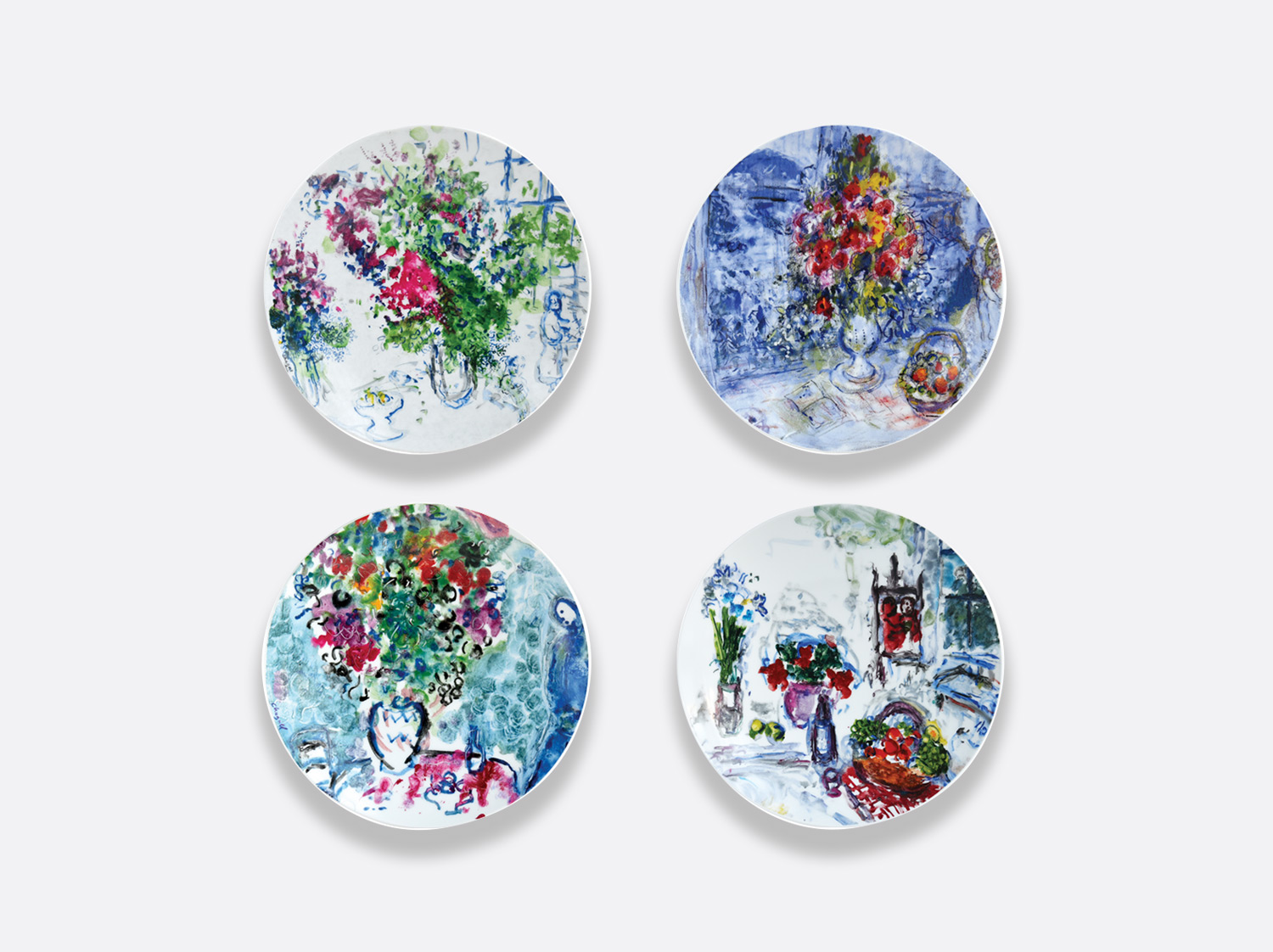 Coffret de 4 assiettes 21 cm assorties en porcelaine de la collection LES BOUQUETS DE FLEURS DE  MARC CHAGALL Bernardaud